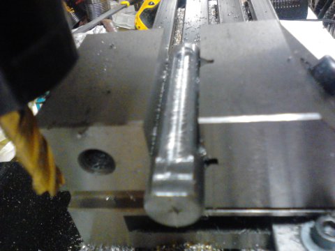Milling out flats on the steel rod